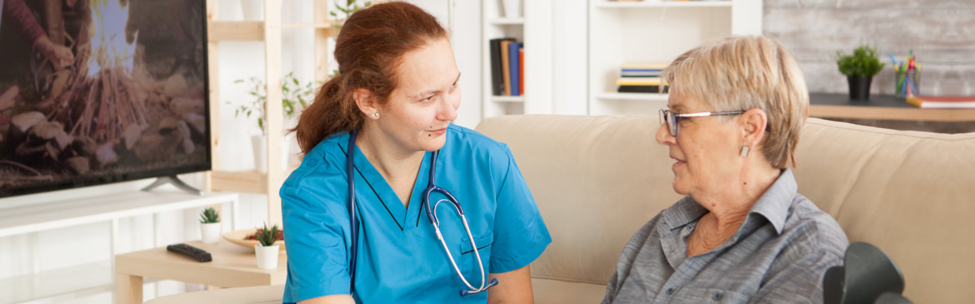 nurse talking to senior