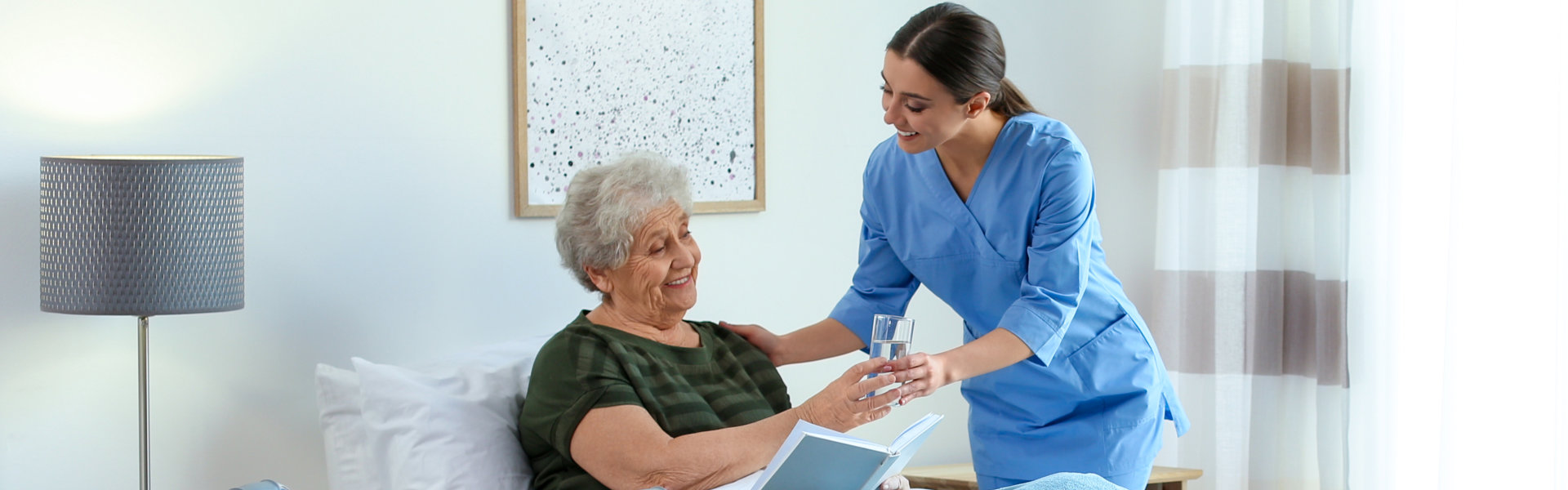 nurse helping elder