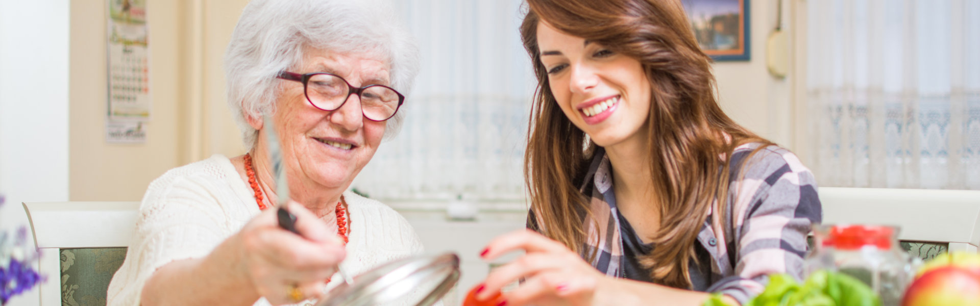 care taker cooking for elder