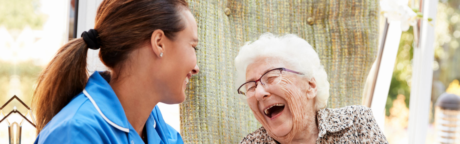 nurse and elder smiling