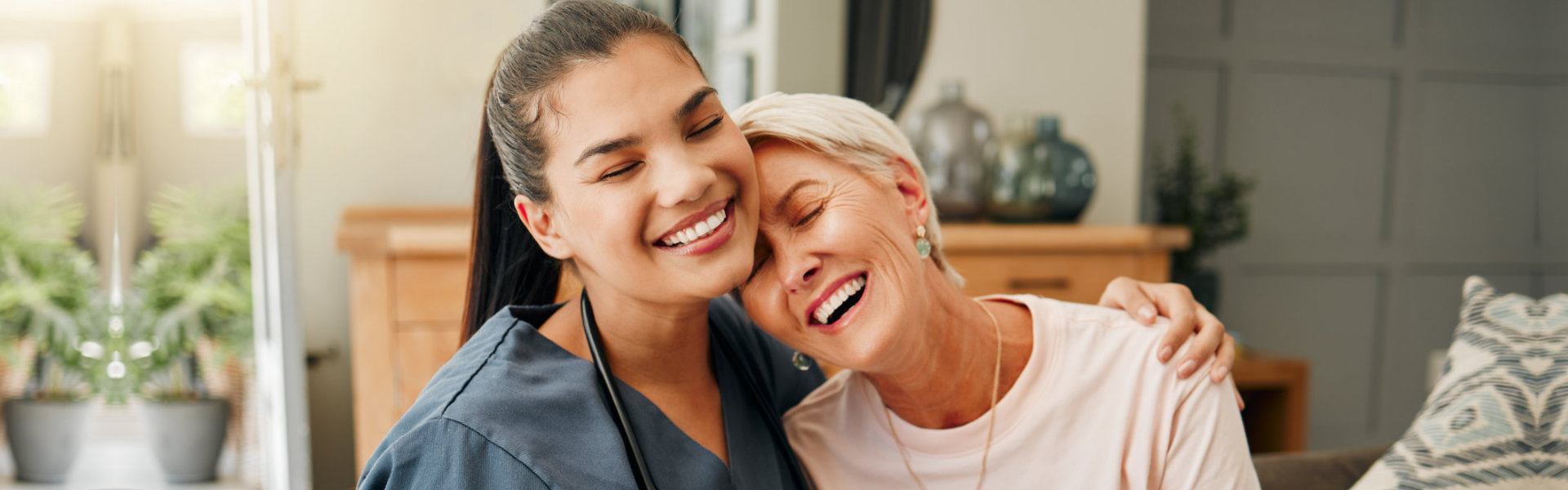 caregiver and senior smiling